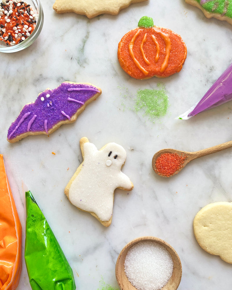 Bat, Ghost, and Pumpkin Cookies with icing and sprinkles make for a scary good time with the Halloween Cookie Decorating Kit
