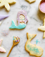 Mermaid, Whale, Seashell and Starfish Cookies with royal icing and sprinkles for decorating with this Cookie Decorating Kit. Feel like Ariel, the mermaid, and her friends under the sea as you decorate.